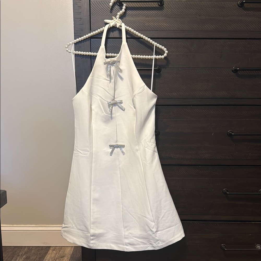Elegant White Halter Dress with Bow Accents